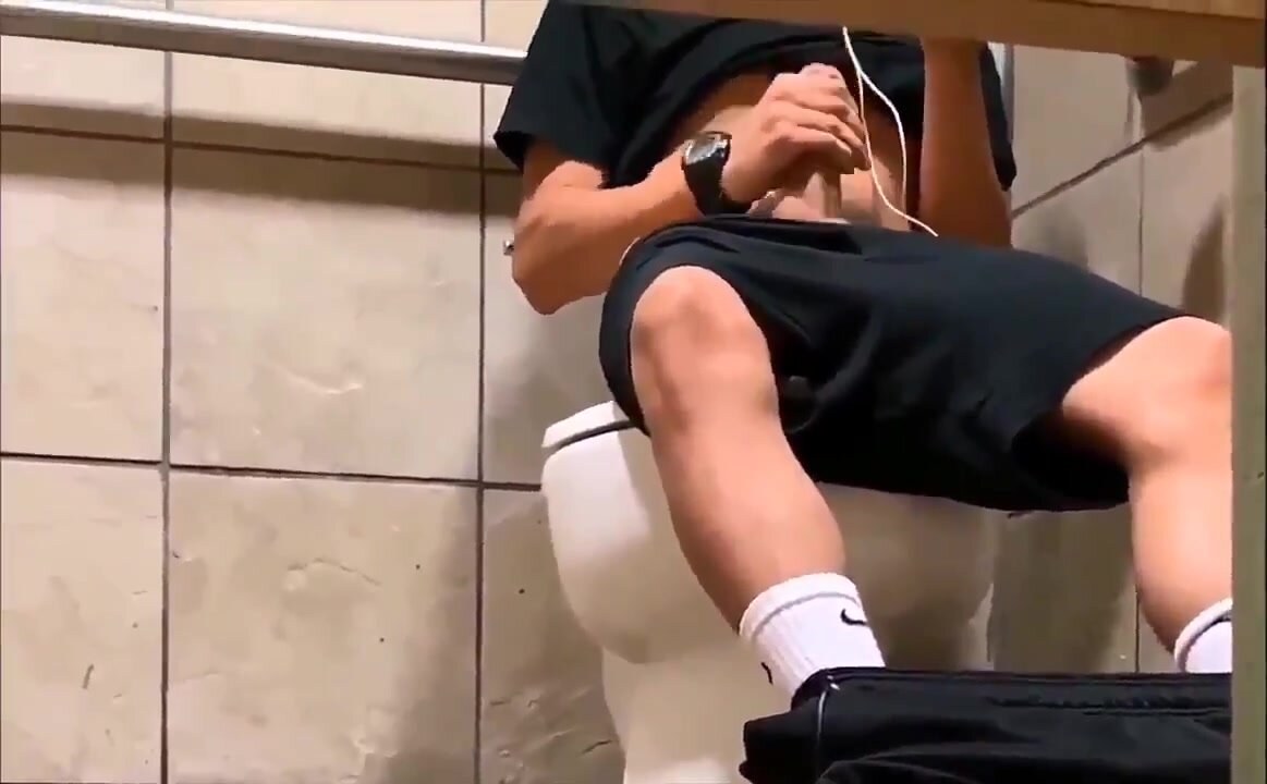 Jerking in a public bathroom