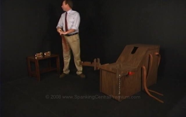 Staged public punishment: spanking. Brian5