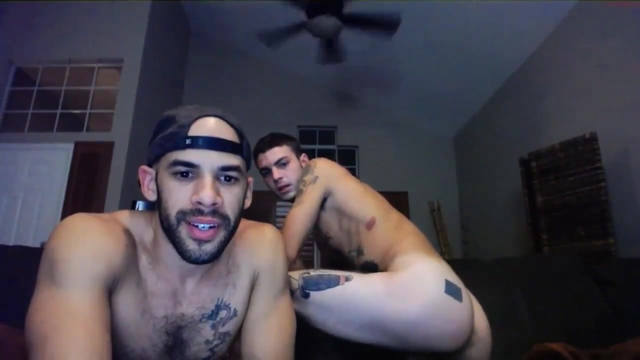 webcam with two tattoed guys