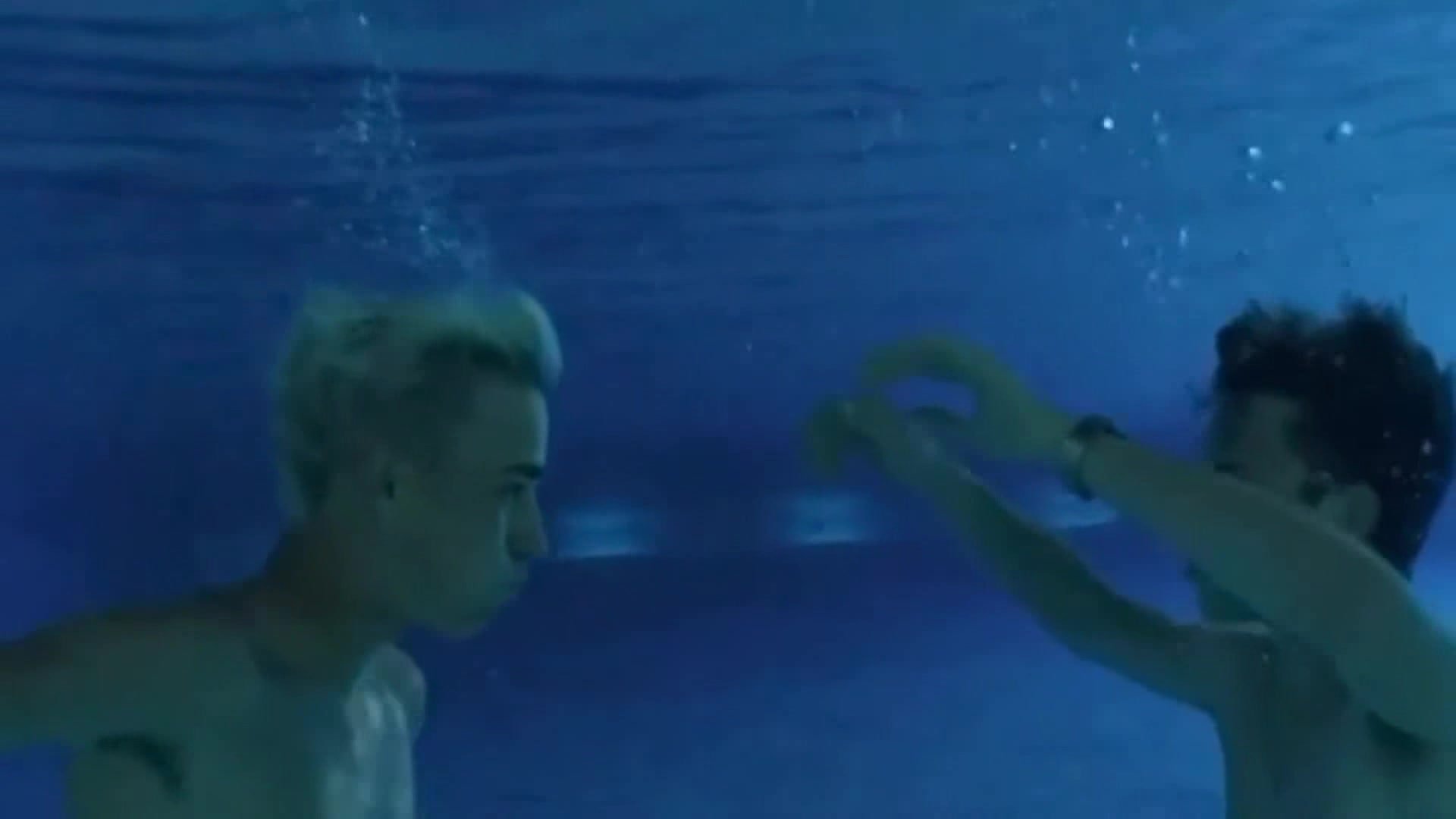 Gay buddies kissing barefaced underwater
