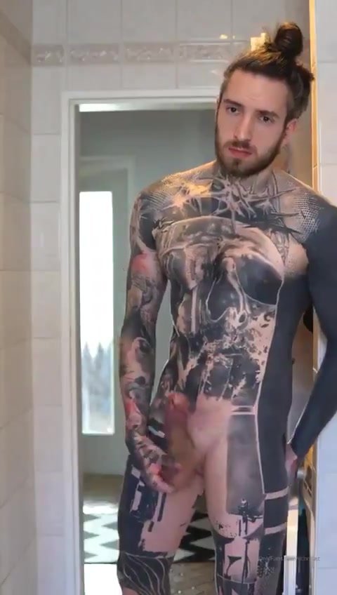 Inked hung dude shows off