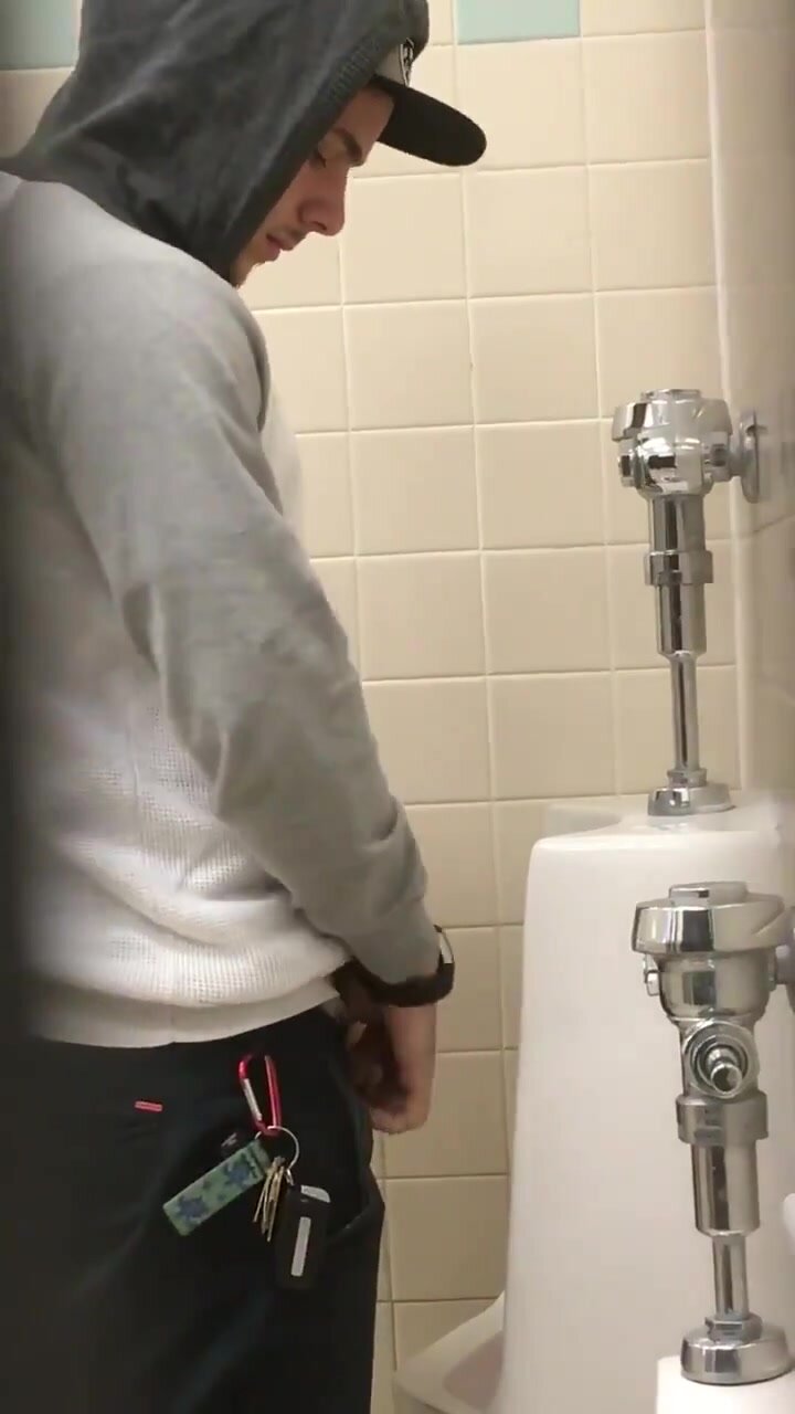 Cute Guy Flopping Around Big Cock At Urinal Catches Guy Filming