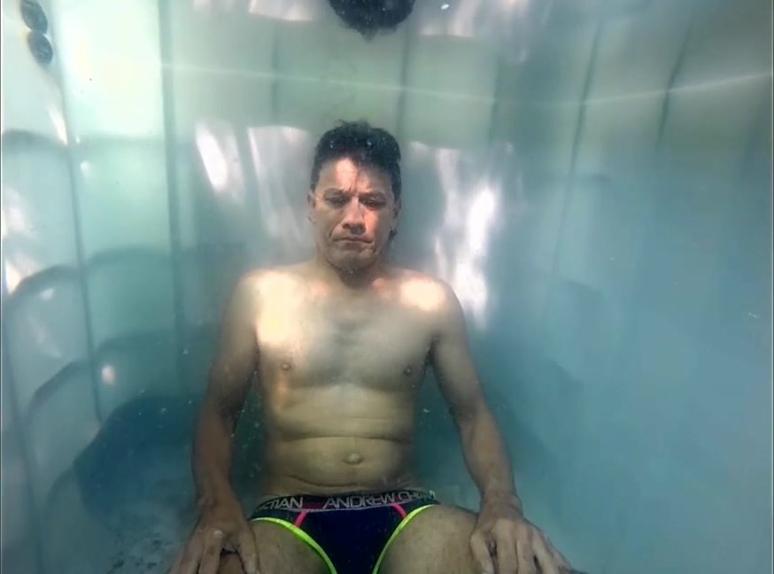 Breatholding barefaced underwater in underwear