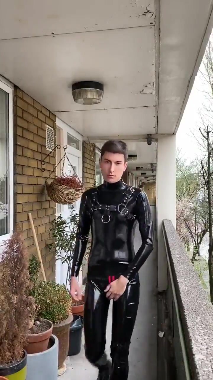 young guy in rubber