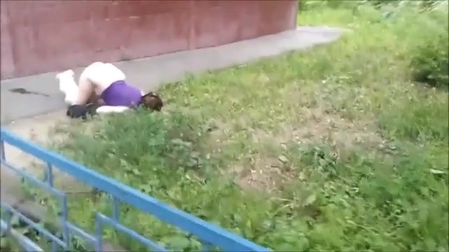 Poor drunk Russian woman fell asleep while taking a shit!