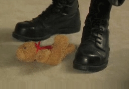Ranger boots trample on teddy bear