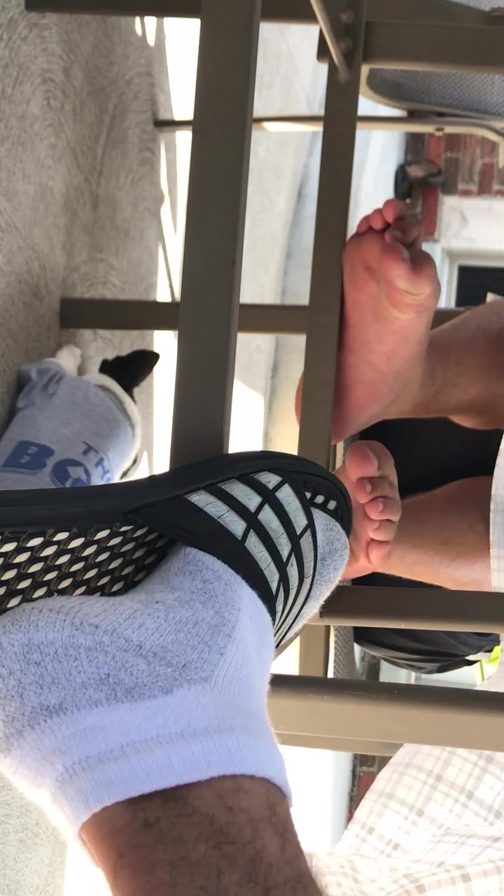 Candid straight police officer feet