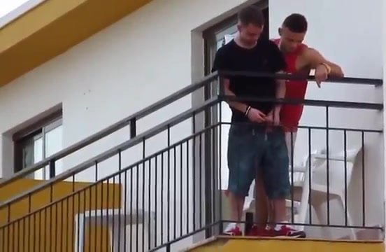 pissed guy pissing off balcony
