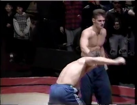hot blonde hunk getting gutpunded and knocked out by hot dark haired guy