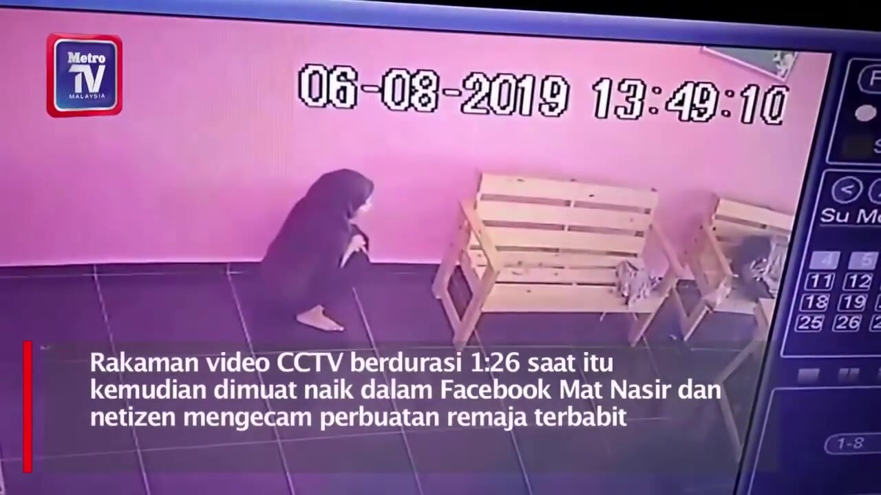 girl caught peeing on CCTV