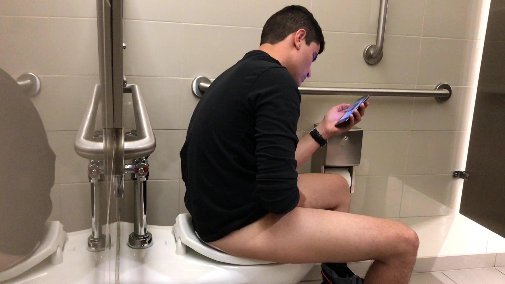 Jerking off in public restroom