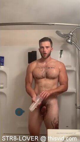 horny tattooed muscled guy in the shower