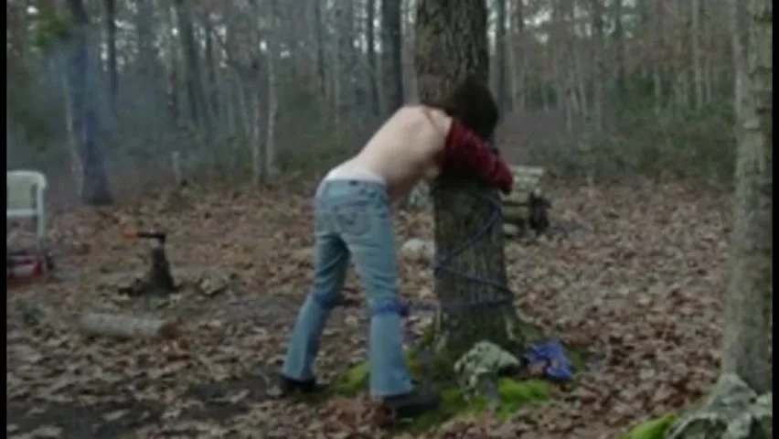 Helpless tied to a tree - ThisVid.com