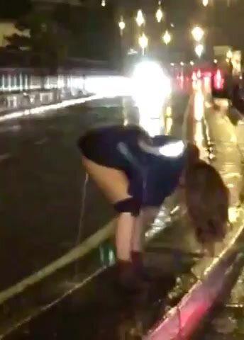 Girl caught peeing on the highway