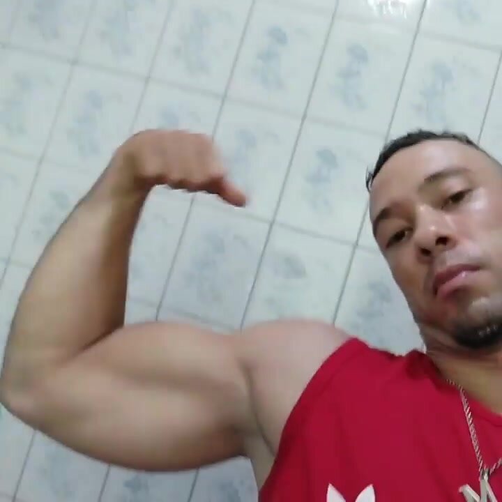 flexing huge biceps