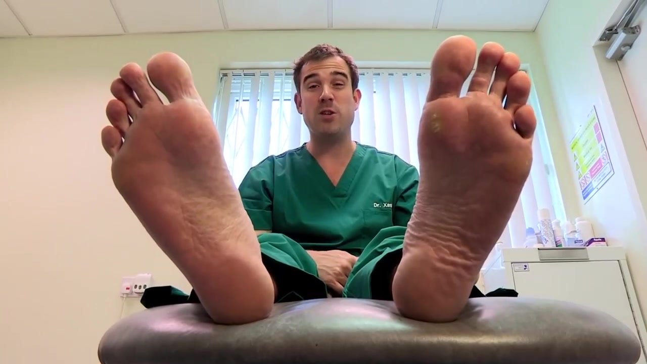 Doctor Shows Feet During Verruca Removal