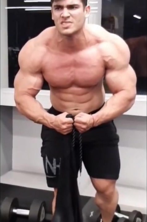 Sexy Atlas Astone flexes his huge Muscles3