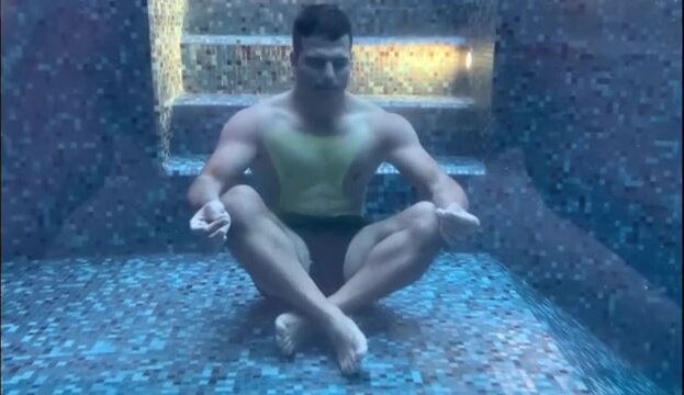 Underwater barefaced yoga hottie in pool