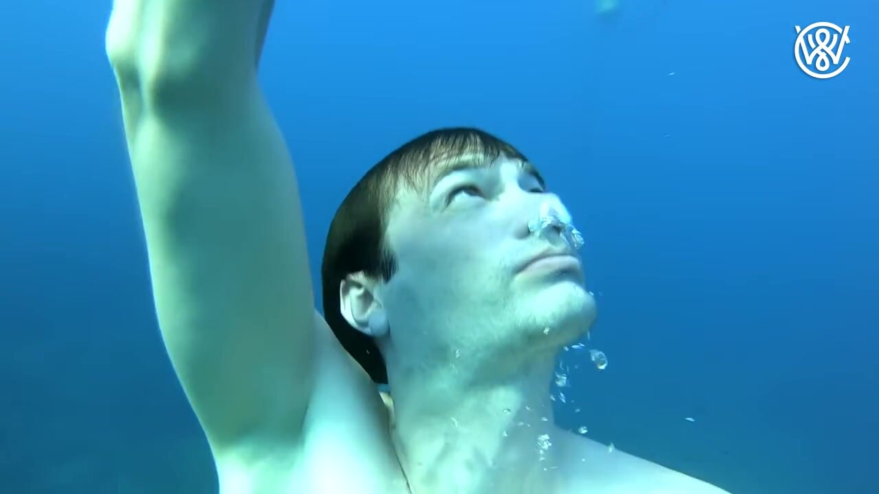Clean shaved pit barefaced man underwater