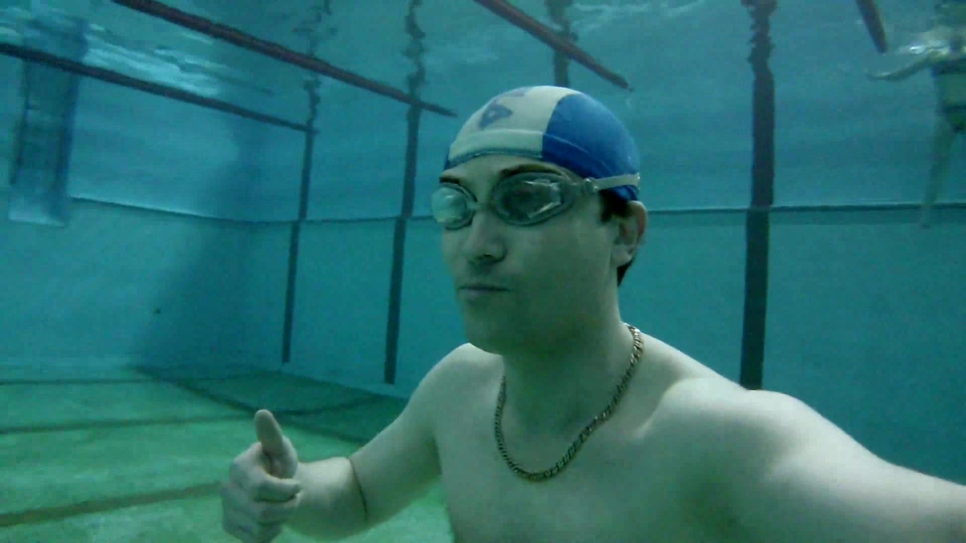 Speedo russian breaholding underwater in pool