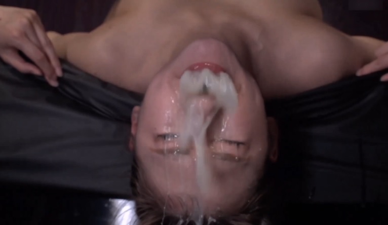 Sexy asian vomits on her own face (upside down)