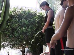 boys pissing on a slave