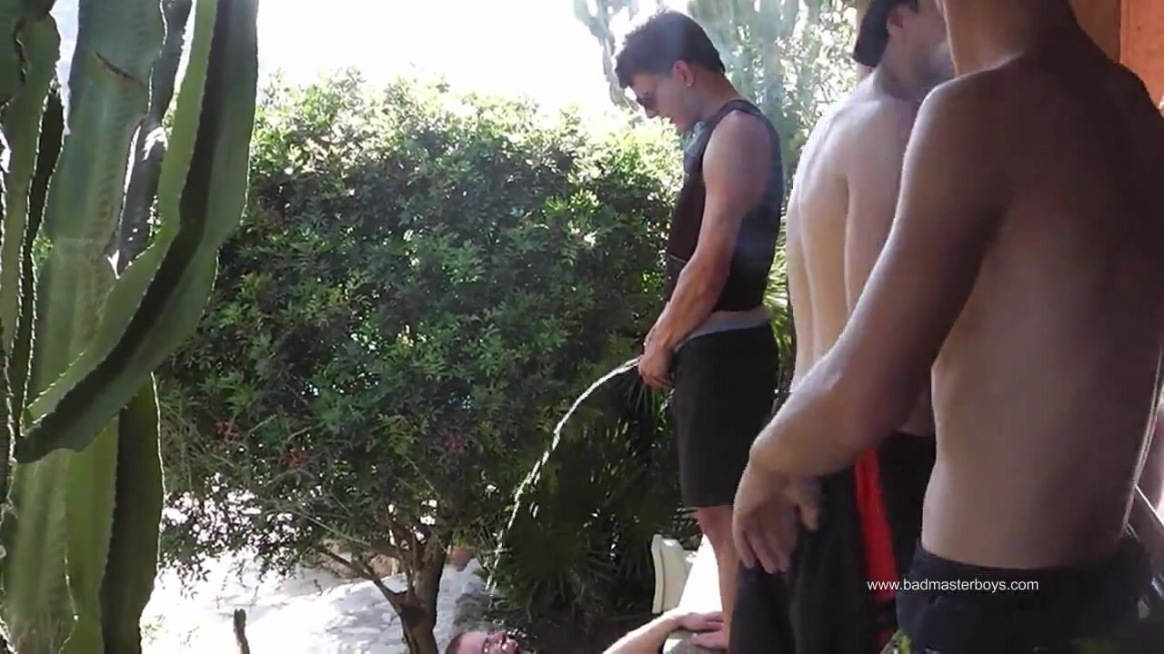 boys pissing on a slave
