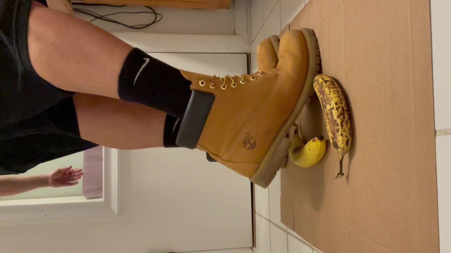 Smashing bananas under my size 13 Timberlands and Air Force Ones