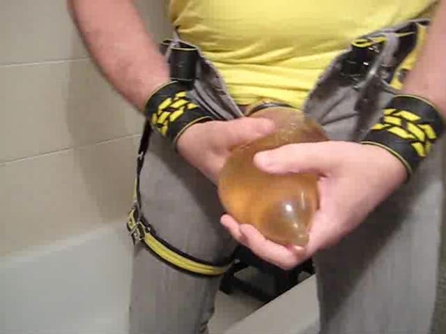 piss condom in tub in 511 with yellow tank