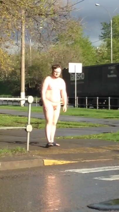 Man cross the street naked