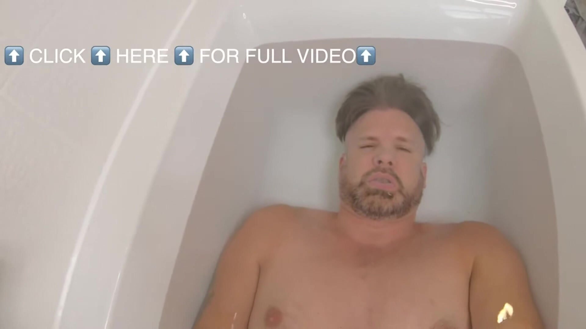 Sexy guy barefaced underwater in tub