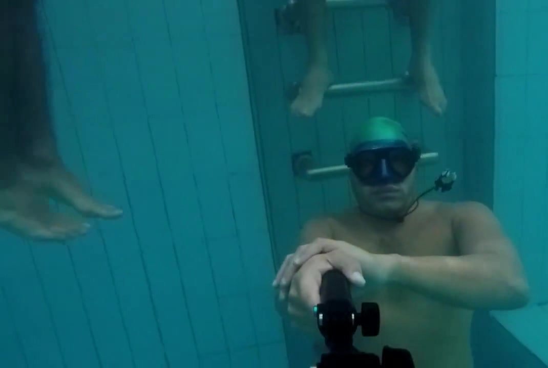 Kareem underwater with fighting friends