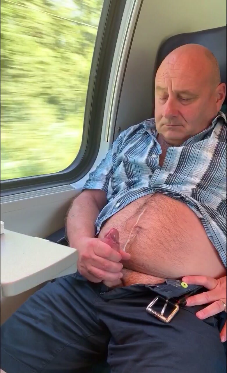 Handsome daddy cums on train