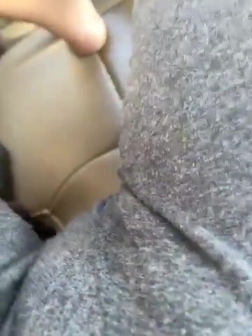 Girl wets diaper in the car