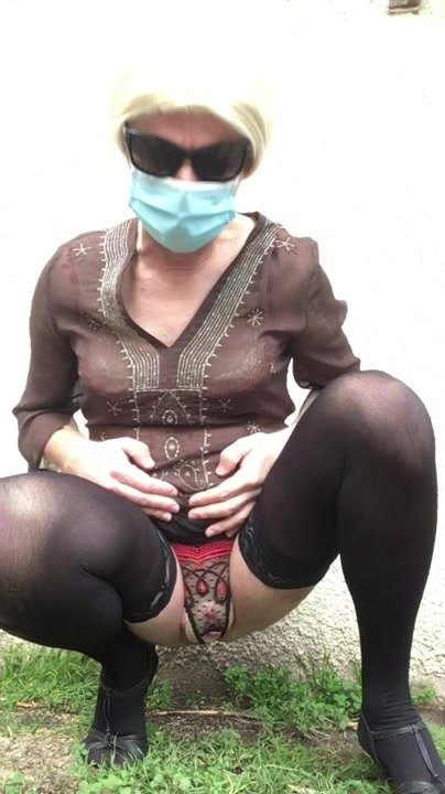 Masked Woman Pee Outdoors