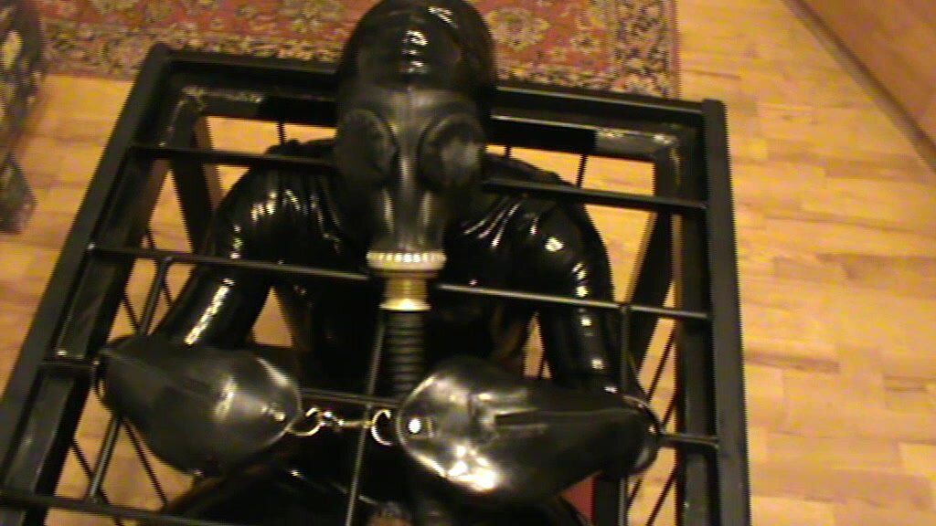 Caged rubberslave - 4