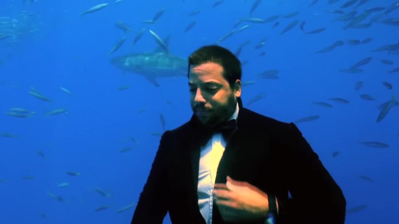 David underwater in tuxedo