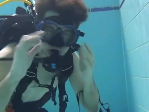 Scubadiver underwater masks removal