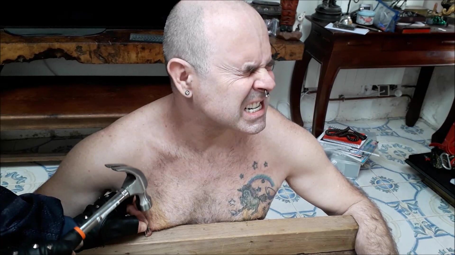 4 nails in the bastard's nipples