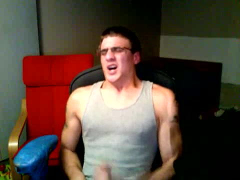 Stud in Glasses Jerks and Cums on Cam in Bedroom