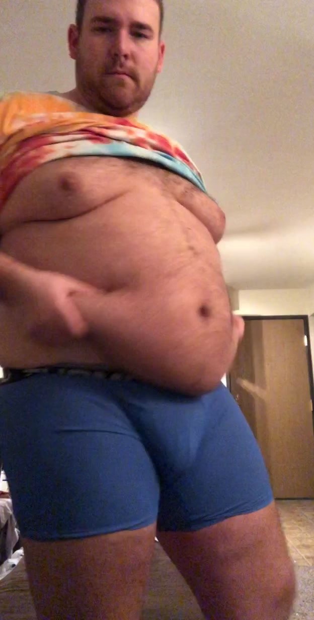 chubby guy showing off new fat