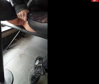 girl pees under table at diner