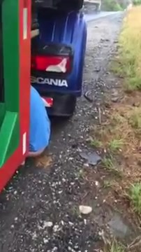 The truck driver shits under his truck!!