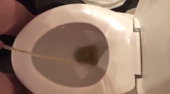Guy piss the toilet