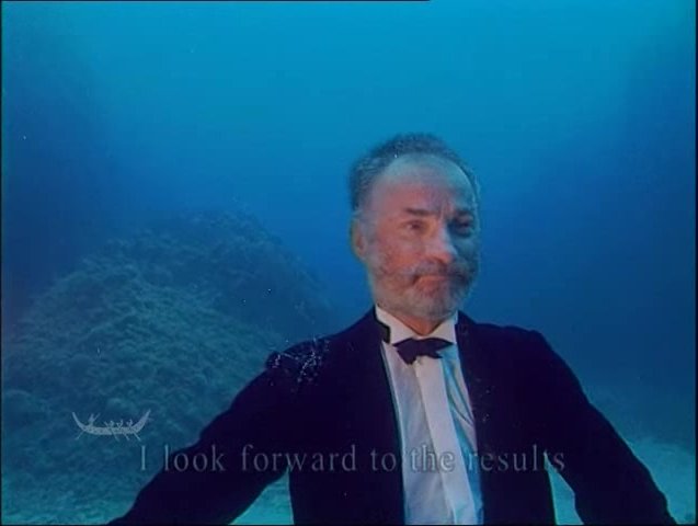 Mature clothed guys barefaced underwater