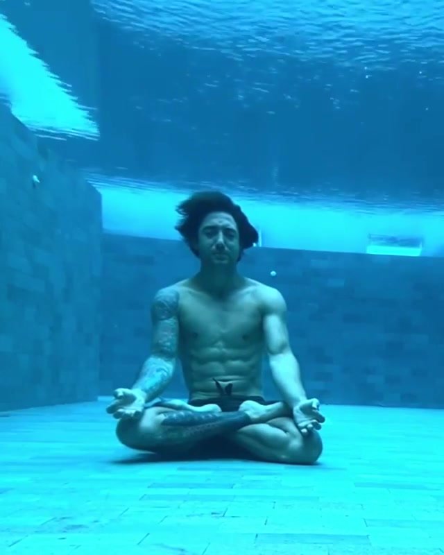 Underwater barefaced exhale yoga