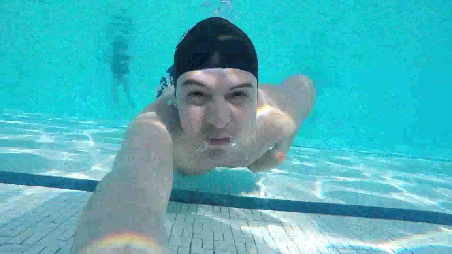 Underwater barefaced swimmer with swimcap