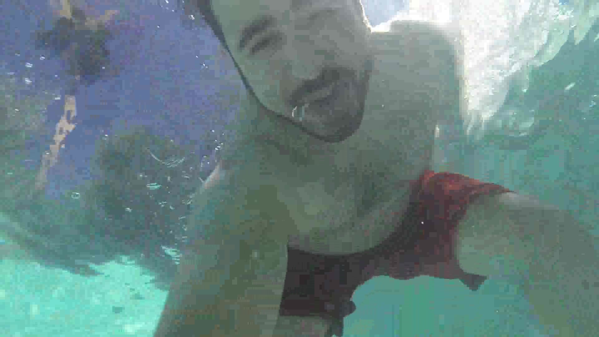 Beefy guys barefaced underwater in pool