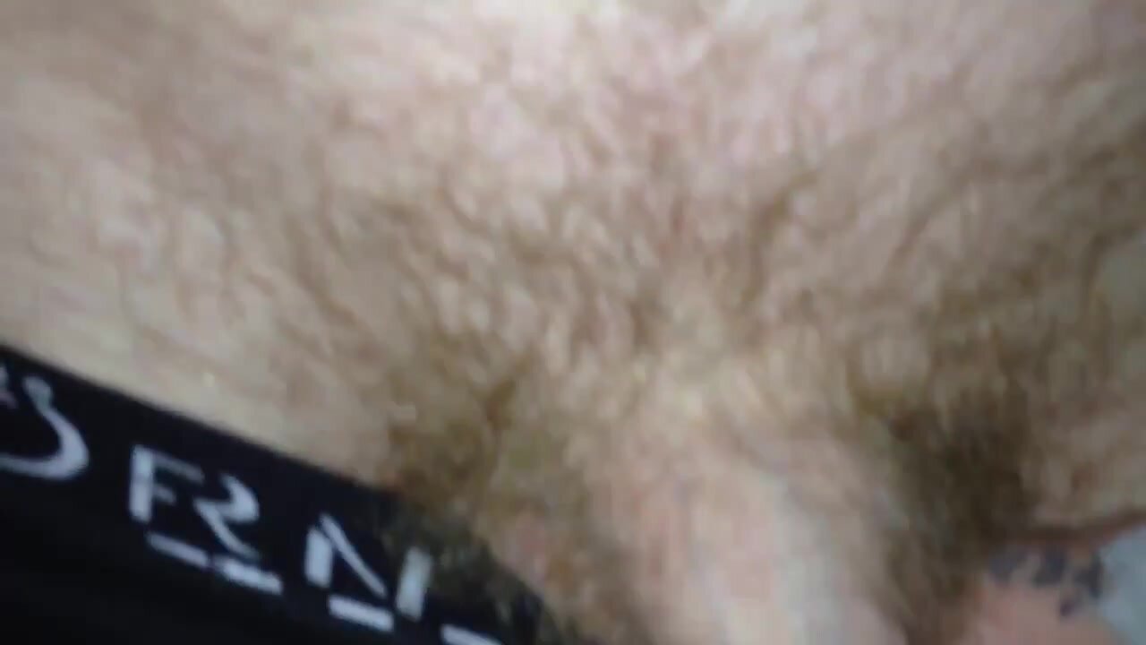 Two lads compare pubes