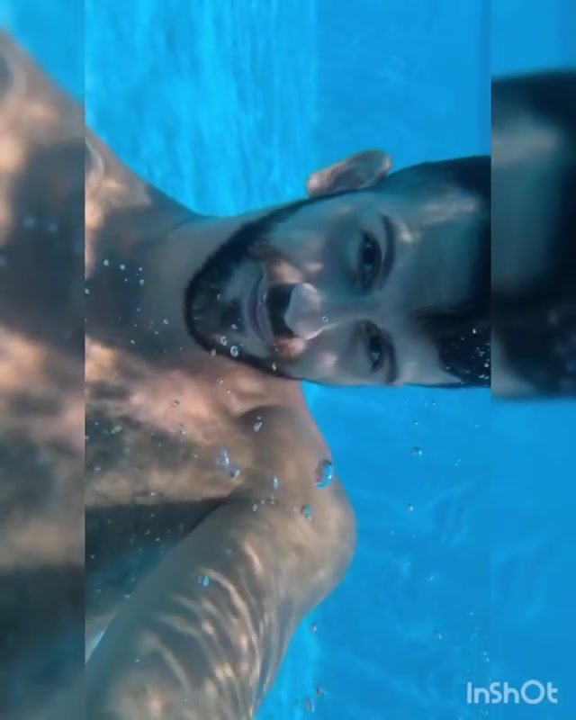 Underwater barefaced selfie in pool